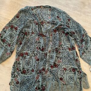 Beautiful sheer top. NWT size large.